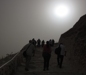 The sun blazed through haze as we climbed to the top of Herodion.