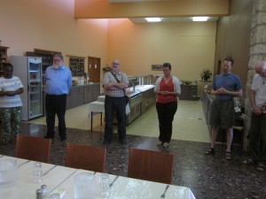 The Tantur participants gather in the dining room for grace before the meal.