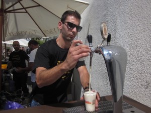 An employee of the brewing company pours a "Golden."