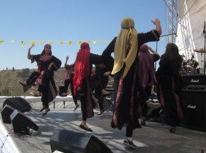 Young women danced to a Middle Eastern soundtrack.