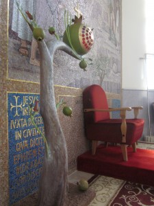 the Latin Church of Christ the Savior has a sanctuary lamp in the form of a pomegranate tree.