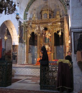 A funeral was in process at Deir el-Zeitouneh.