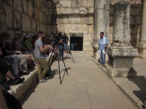 A Christian evangelist preaches to the camera.