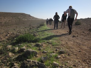 Hikers walk near Makhtesh Gadol.