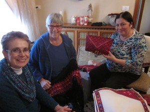 Bridget and Anne Jordan purchase handicrafts from Ida in Bethlehem.